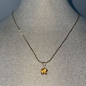 Manon Gold tone necklace with November birth stone pendant